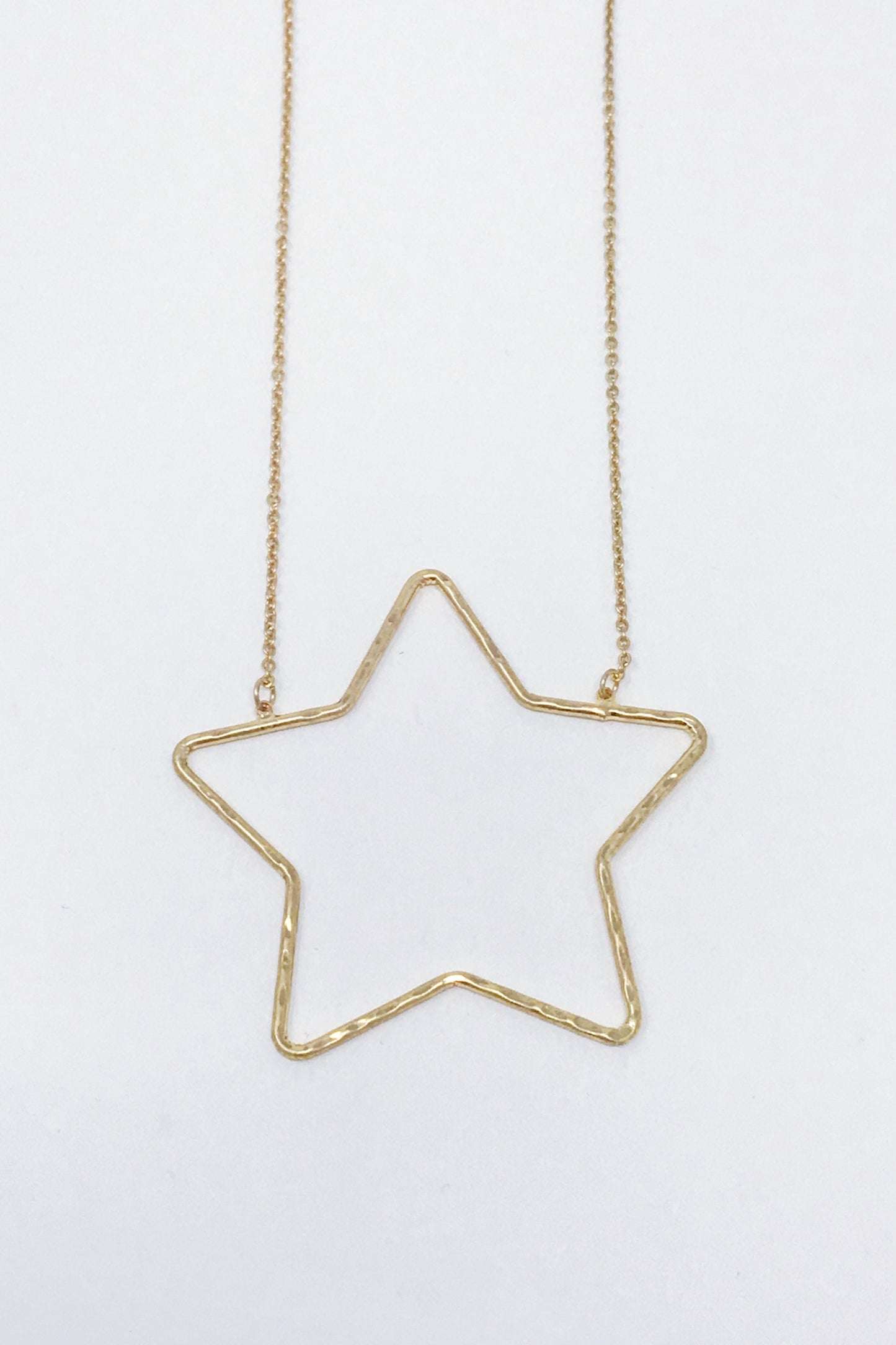 Gold Pendant star necklace from Online jewelry Boutique Ellison + Young