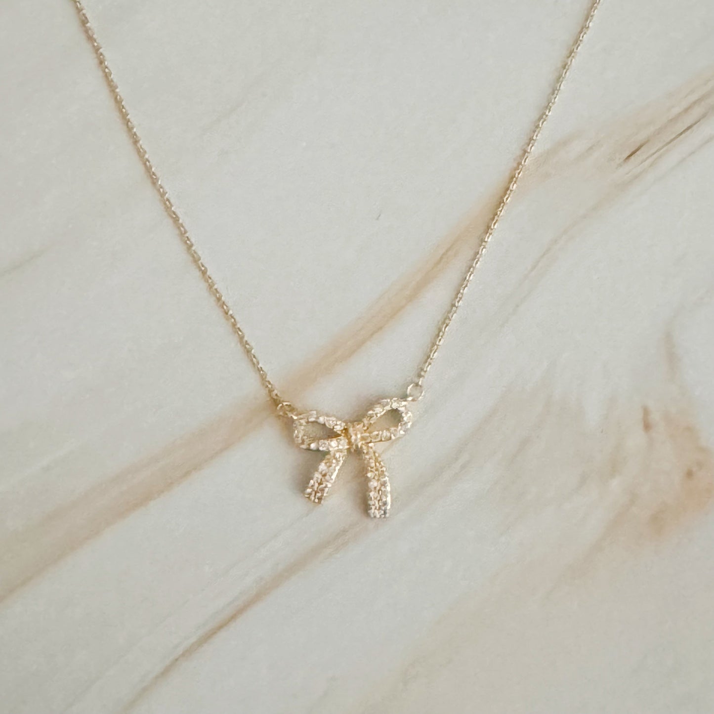 Simply Shine Bow Necklace by Ellisonyoung.com
