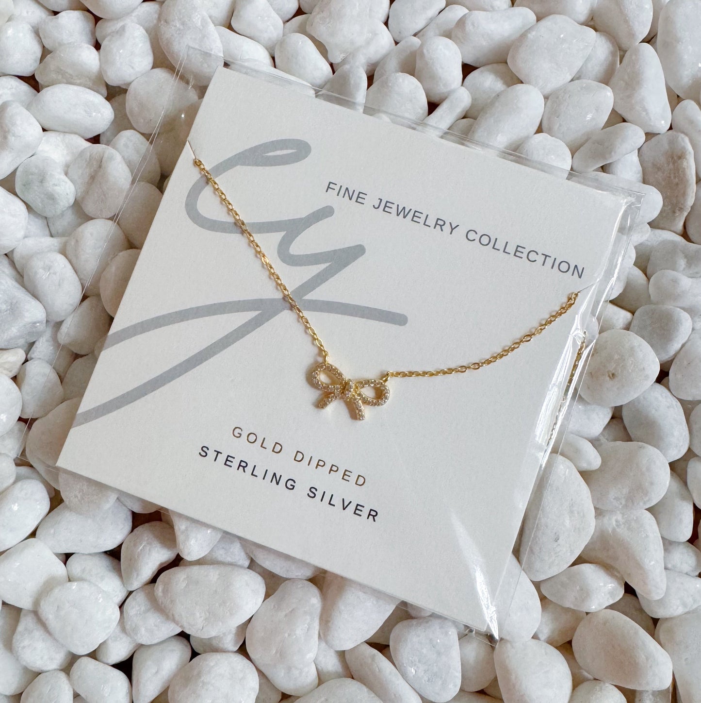 Shine Classy Bow Sterling Silver Necklace by Ellisonyoung.com