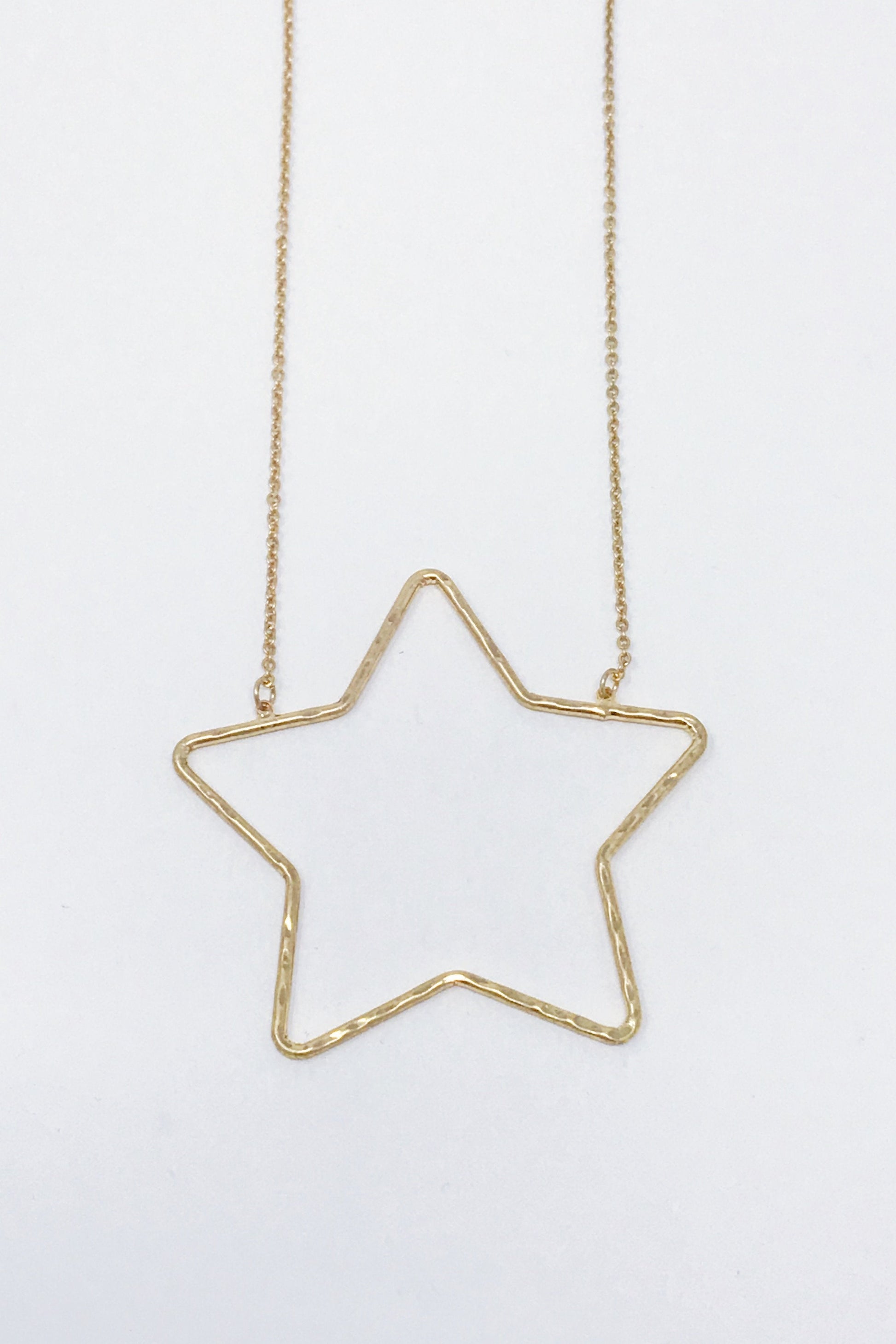 Gold Pendant star necklace from Online jewelry Boutique Ellison + Young